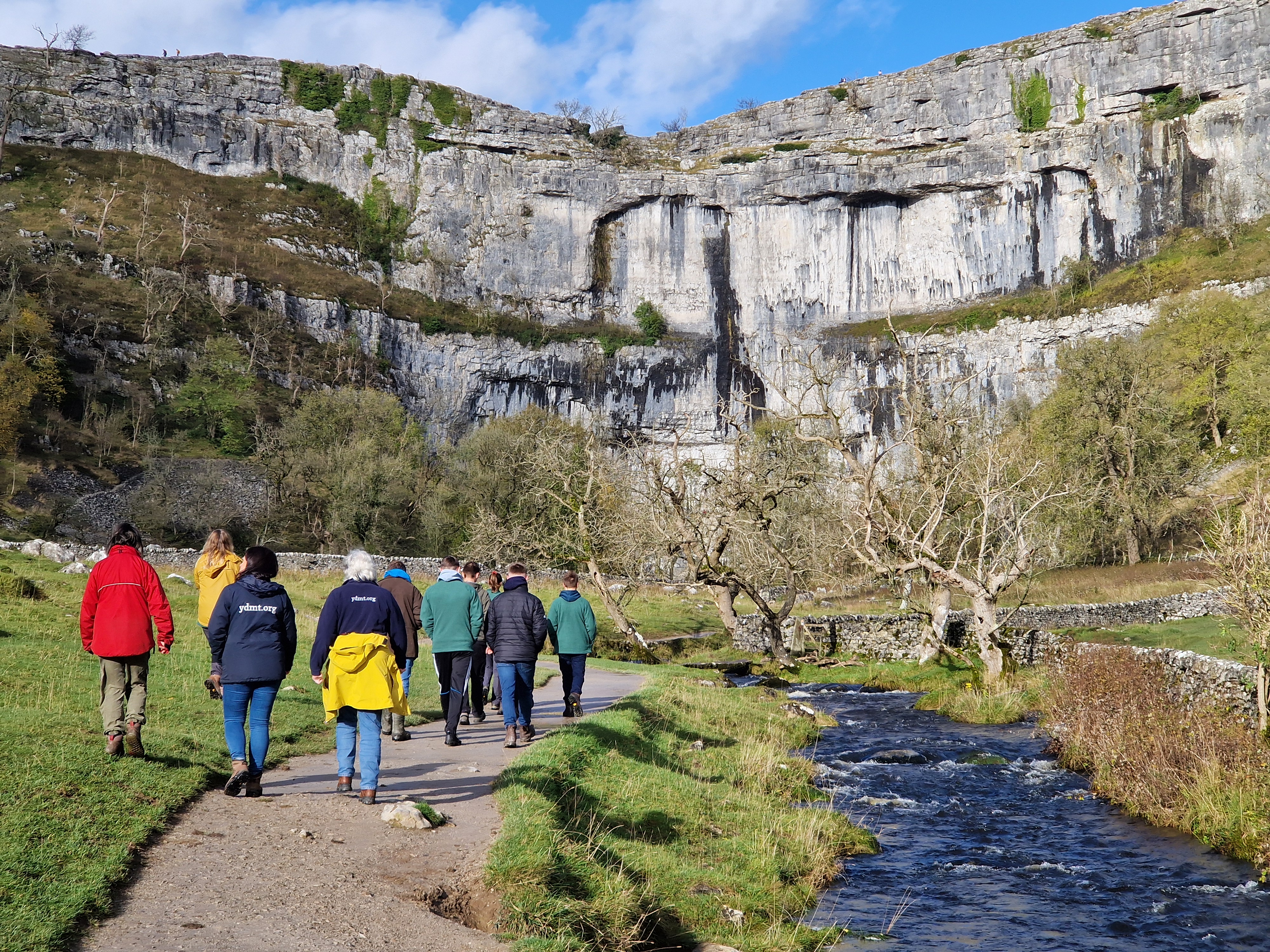People walking at Malham Cove